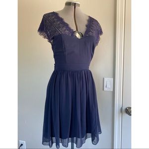 Navy blue mini-dress, deep V lace front and back